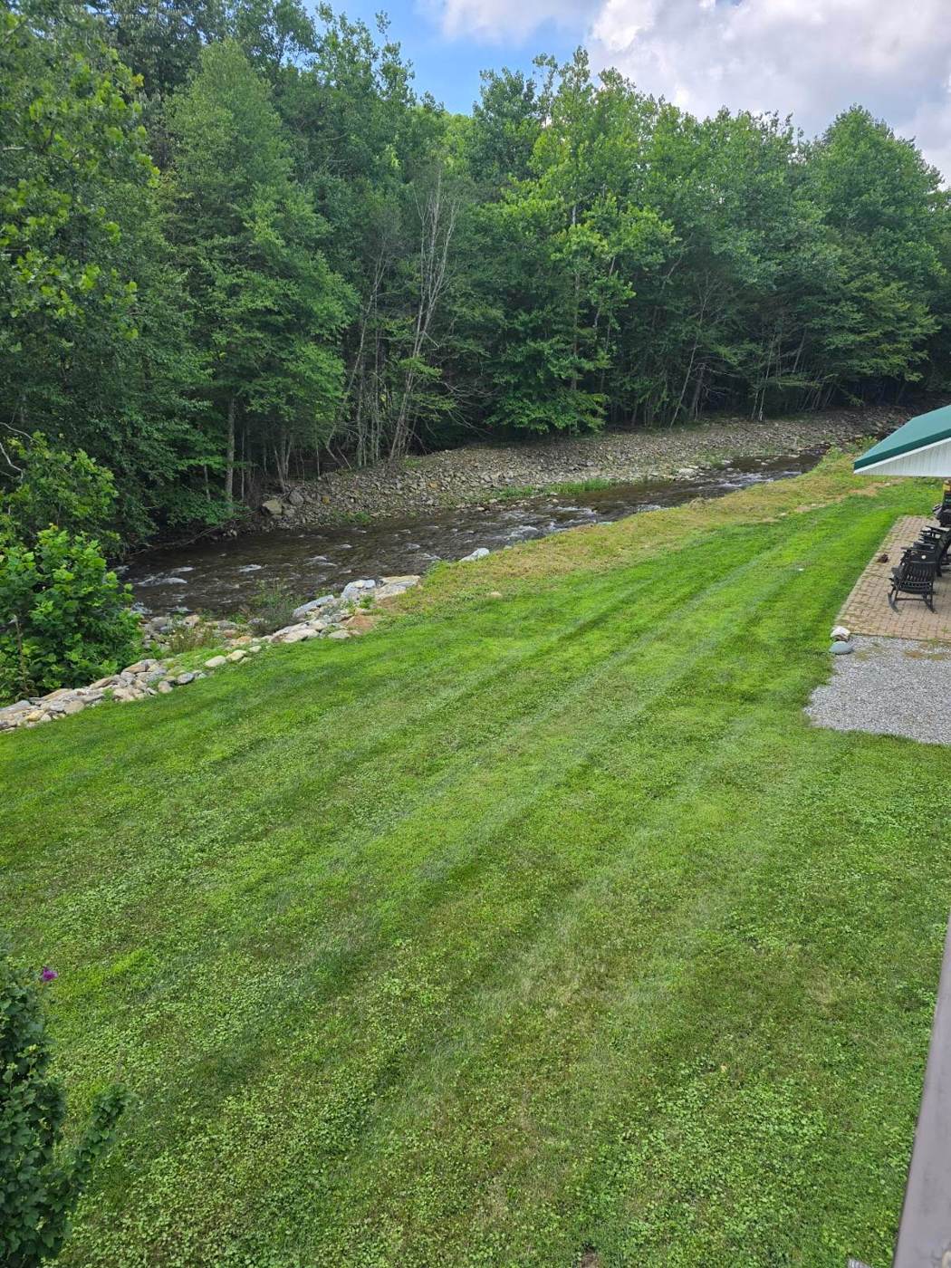 Big Wilson Creek as seen from the lawn behind the store.